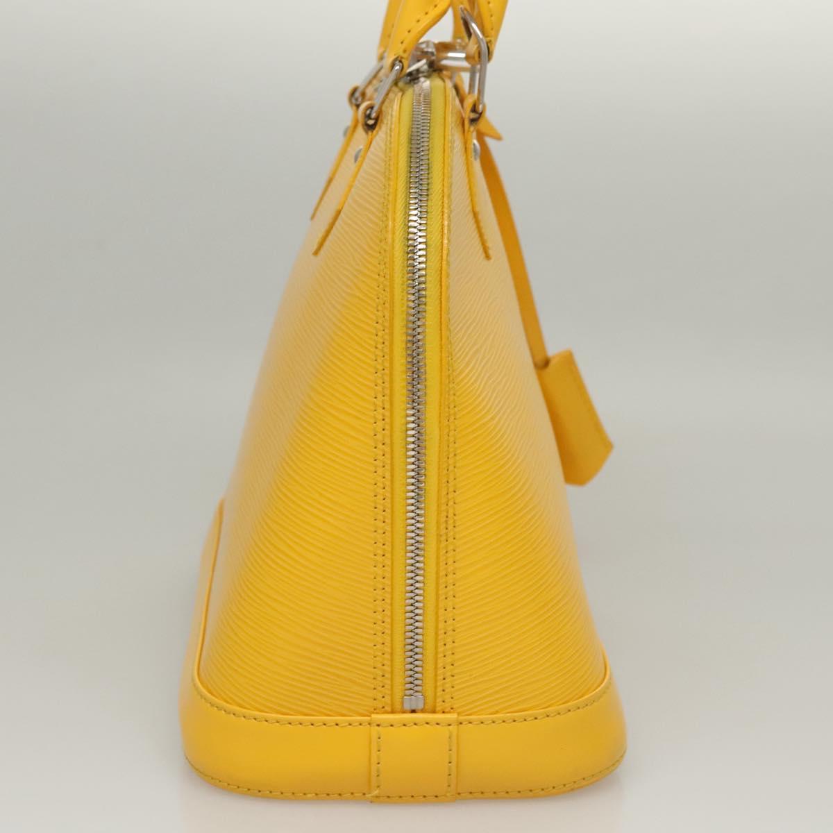 Louis Vuitton Alma, Yellow, Leather, handbag