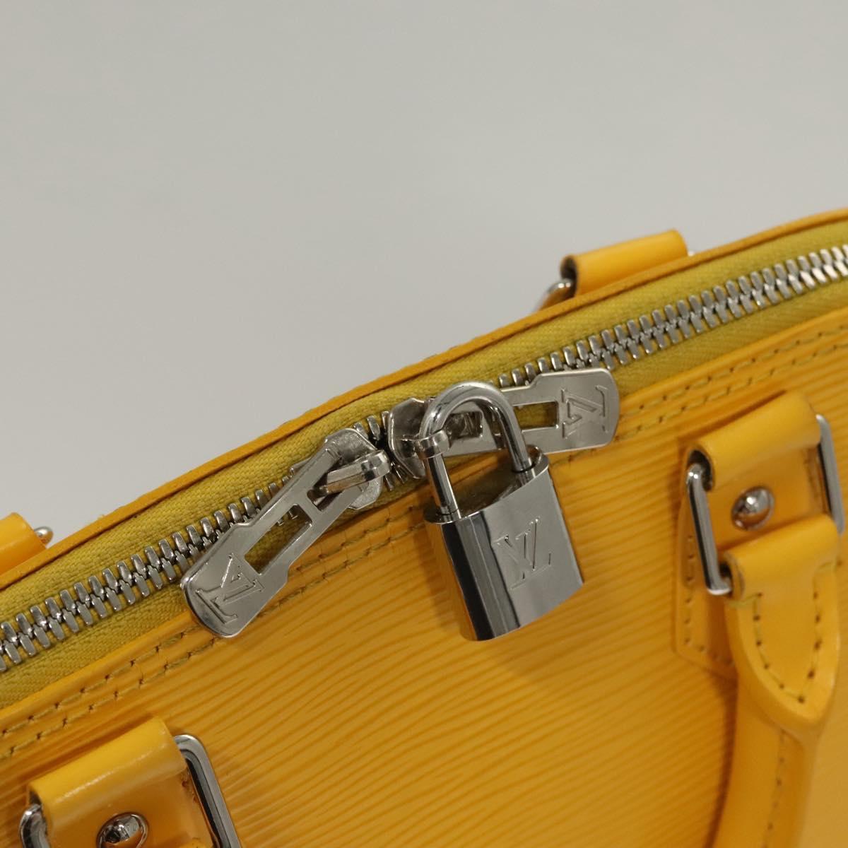Louis Vuitton Alma, Yellow, Leather, handbag