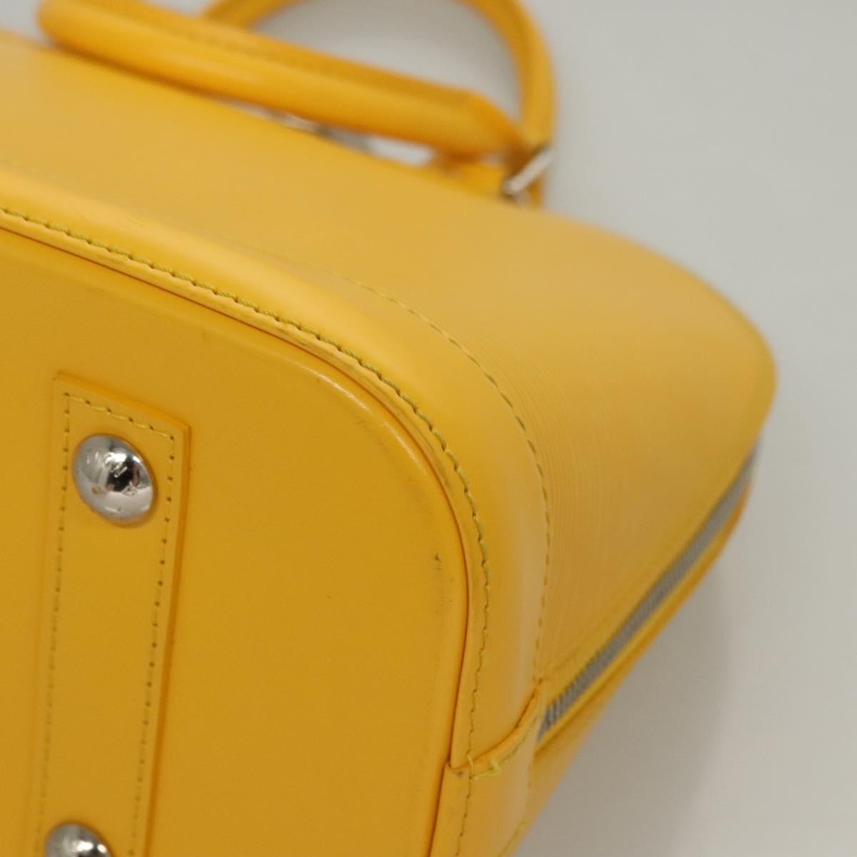 Louis Vuitton Alma, Yellow, Leather, handbag