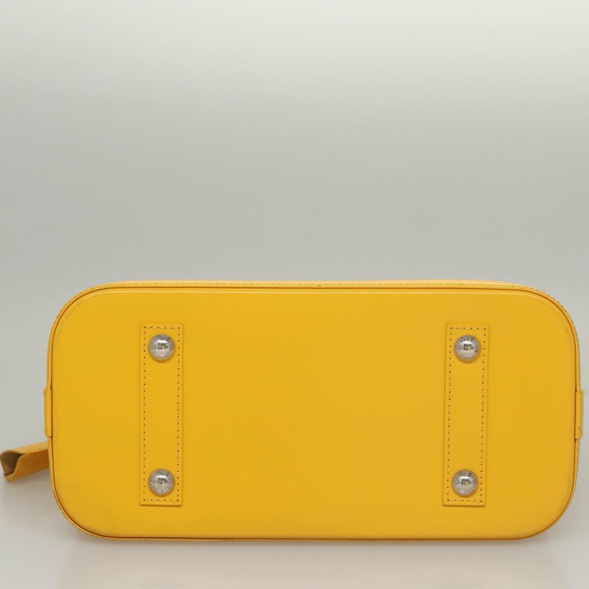 Louis Vuitton Alma, Yellow, Leather, handbag
