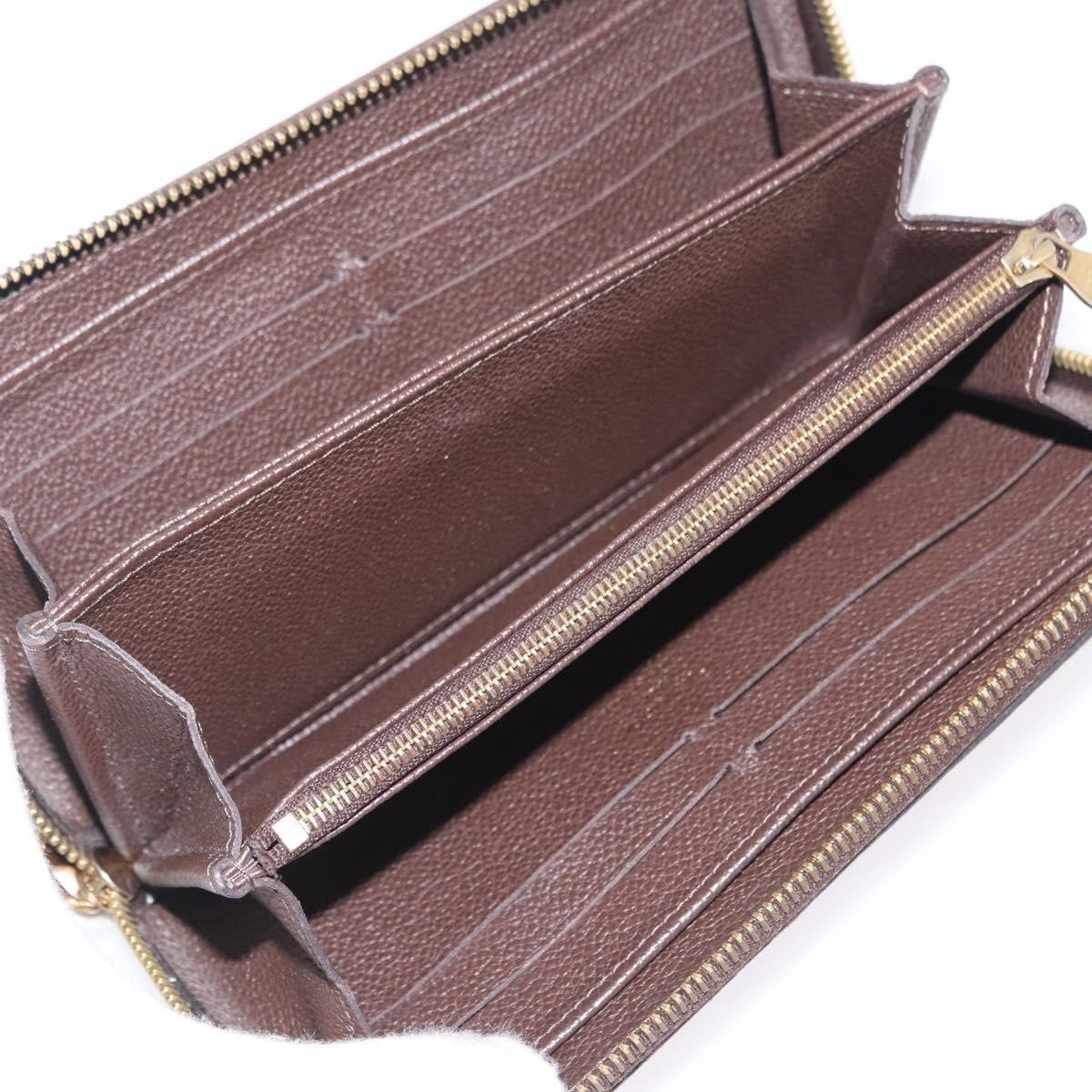 Louis Vuitton Portefeuille zippy Monogramme Empreinte monogramme empreinte, Brown, Leather, Wallet