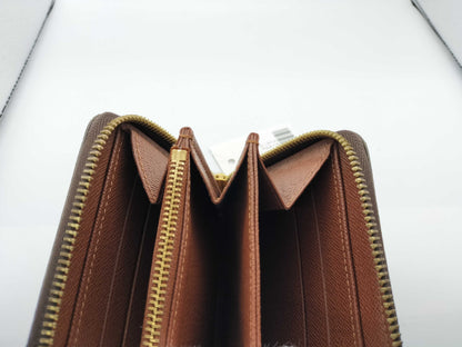 Louis Vuitton Zippy Monogram Canvas, Brown, Canvas, Wallet