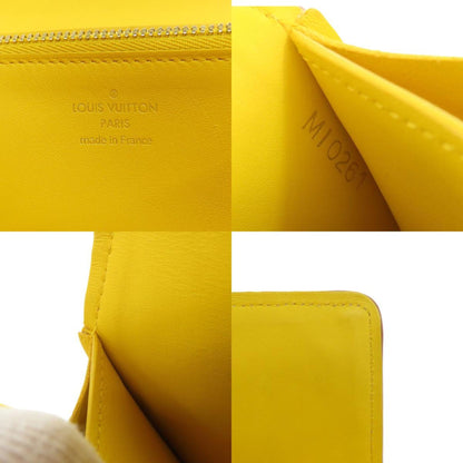 Louis Vuitton Capucines, Yellow, Canvas, wallet