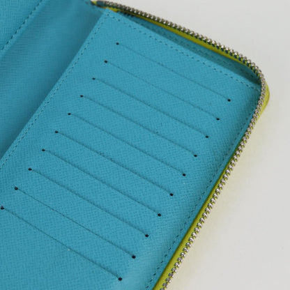 Louis Vuitton Zippy Wallet Vertical, Yellow, Canvas, wallet