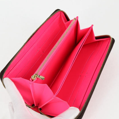 Louis Vuitton Portefeuille zippy, Pink, Canvas, wallet