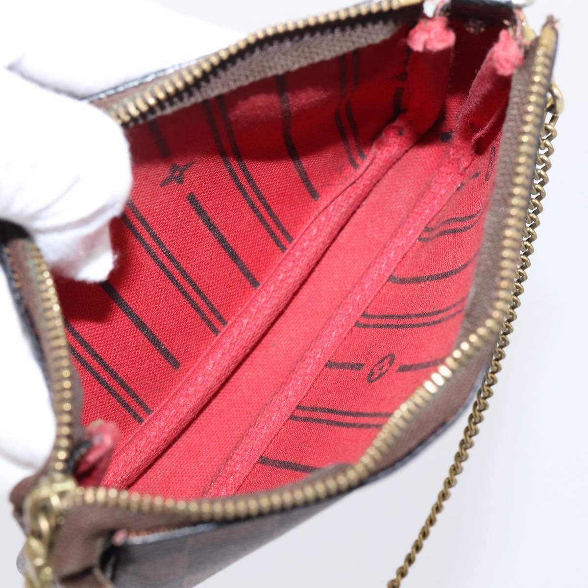 Louis Vuitton Mini pochette accessoires Damier Canvas, Brown, Canvas, Clutch