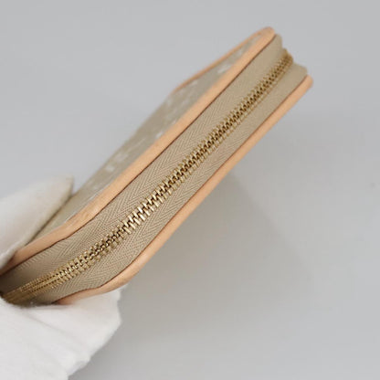 Louis Vuitton Zippy coin purse, Gold, Canvas, wallet