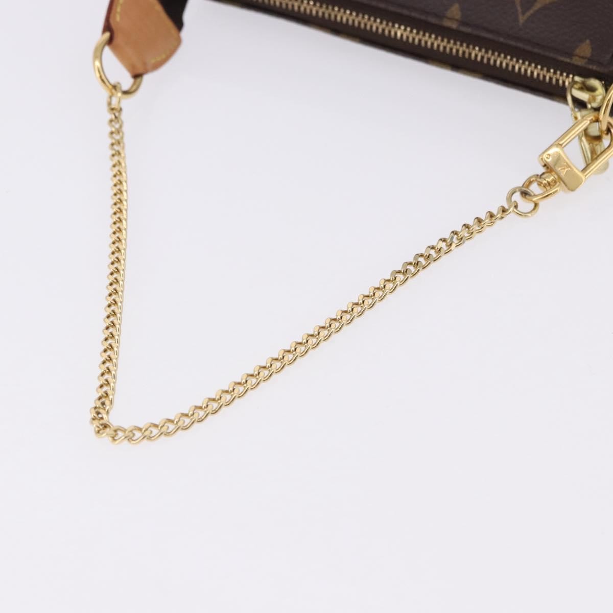 Louis Vuitton Mini pochette accessoires Canvas, Brown, Canvas, Clutch