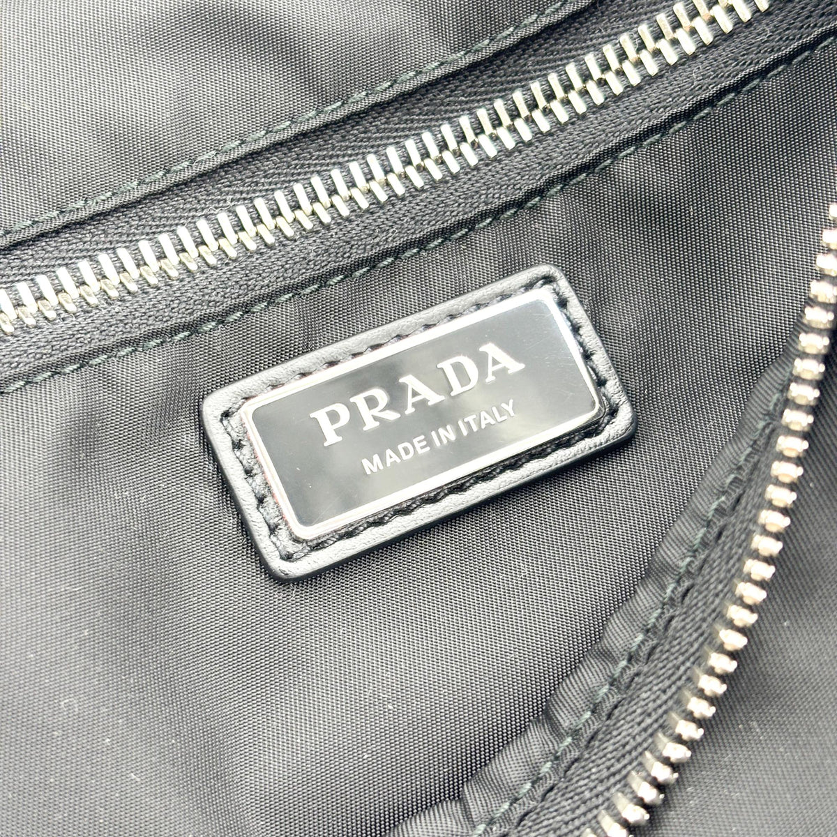 Prada Triangle Zip Sling Re-Nylon with Leather, Black, Nylon, Backpack