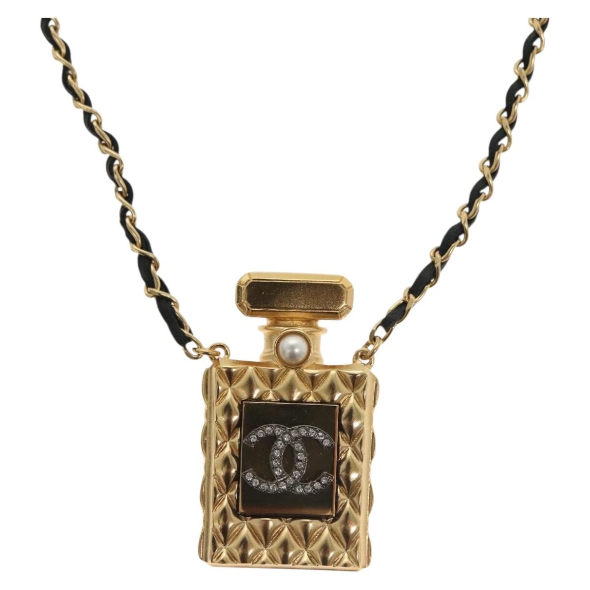 "Chanel CC Perfume Bottle Pendant Chain Long Metal with Leather, Crystals and Faux Pearl", Gold, Metal, Necklace