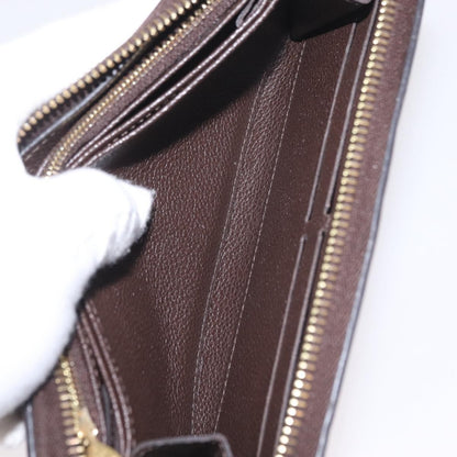 Louis Vuitton Portefeuille zippy Monogramme Empreinte monogramme empreinte, Brown, Leather, Wallet