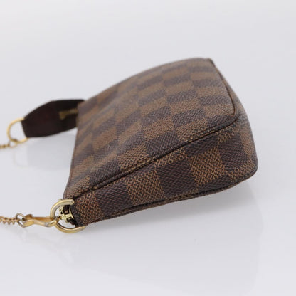 Louis Vuitton Mini pochette accessoires Damier Canvas, Brown, Canvas, Clutch