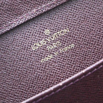 Louis Vuitton Pochette Baikal Clutch Taiga Leather, Burgundy, Leather, Clutch
