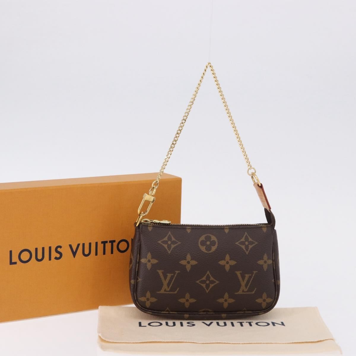 Louis Vuitton Mini pochette accessoires Canvas, Brown, Canvas, Clutch