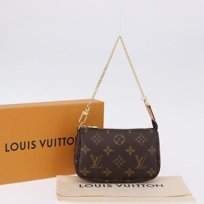 Louis Vuitton Mini pochette accessoires Canvas, Brown, Canvas, Clutch
