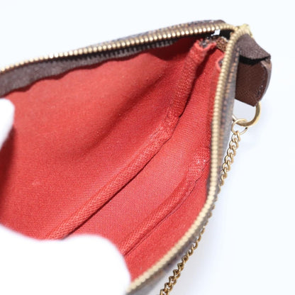 Louis Vuitton Mini pochette accessoires Damier Canvas, Brown, Canvas, Clutch