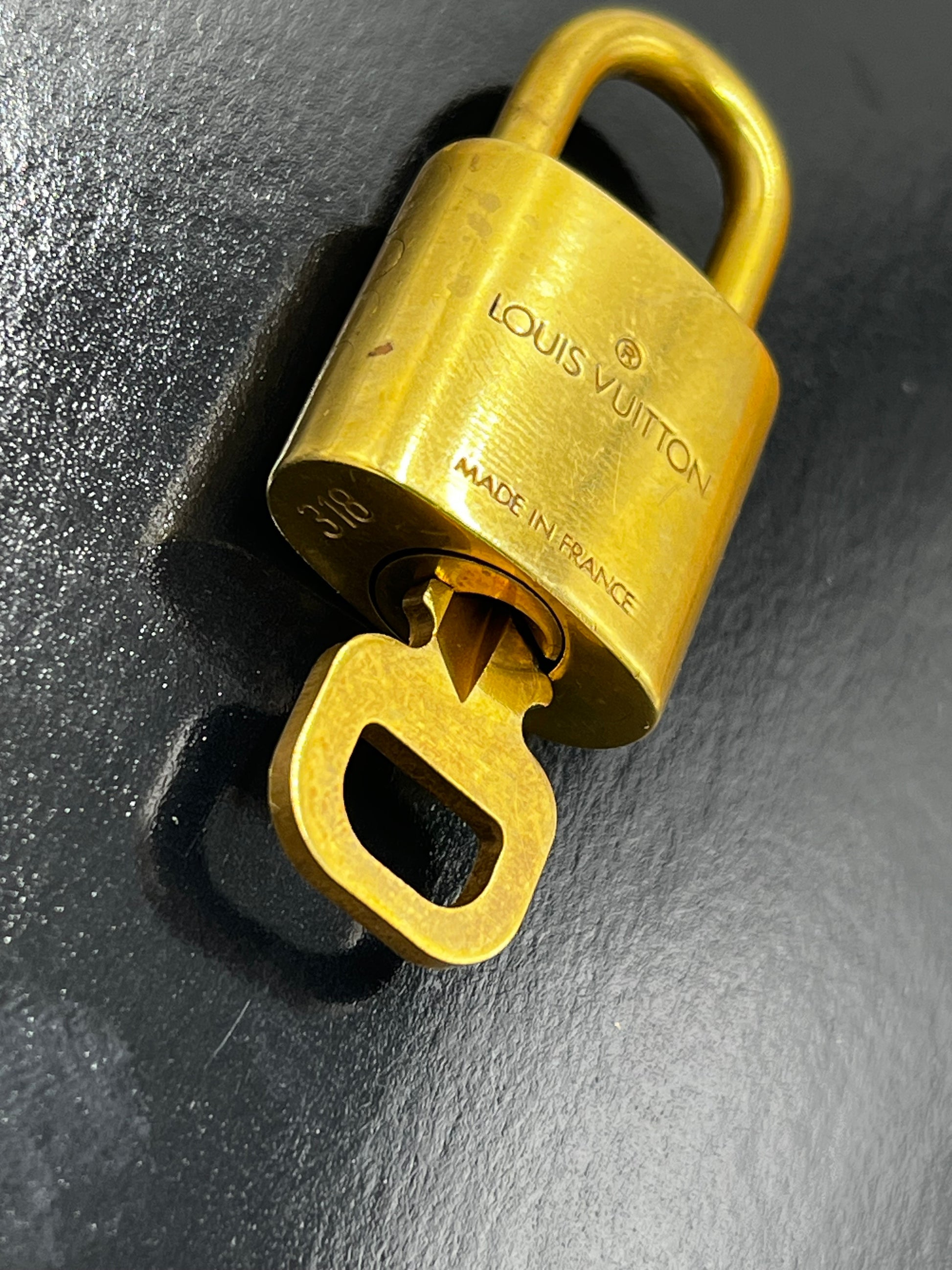 Louis Vuitton Padlock and Key Logo Metal, Gold, Metal, Charm