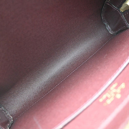 Louis Vuitton Pochette Baikal Clutch Taiga Leather, Burgundy, Leather, Clutch