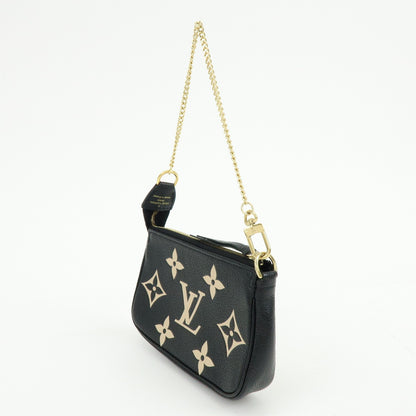 Louis Vuitton Pochette Accessoires Bicolor Monogram Empreinte Giant, Black, Leather, Clutch