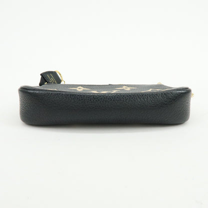 Louis Vuitton Pochette Accessoires Bicolor Monogram Empreinte Giant, Black, Leather, Clutch