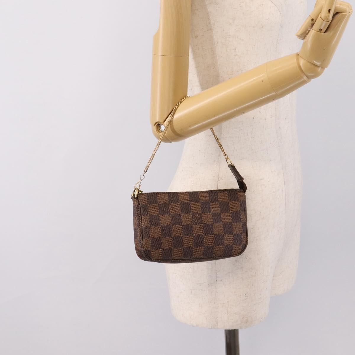 Louis Vuitton Mini pochette accessoires Damier Canvas, Brown, Canvas, Clutch