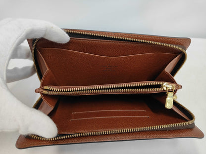 Louis Vuitton Portefeuille zippy Monogramme Empreinte monogramme empreinte, Brown, Leather, Wallet