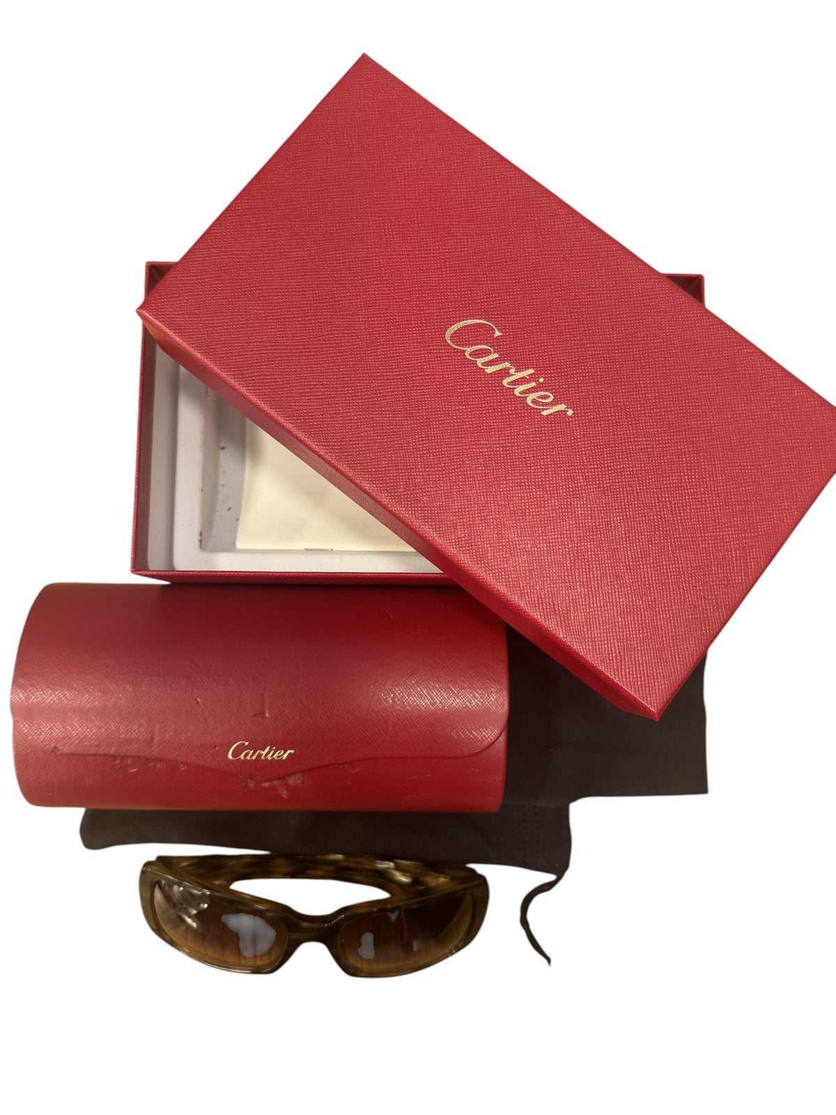 Brandsamsara Cartier sunglasses with tortoiseshell acetate frames, medium tint lenses, original red case, and box.