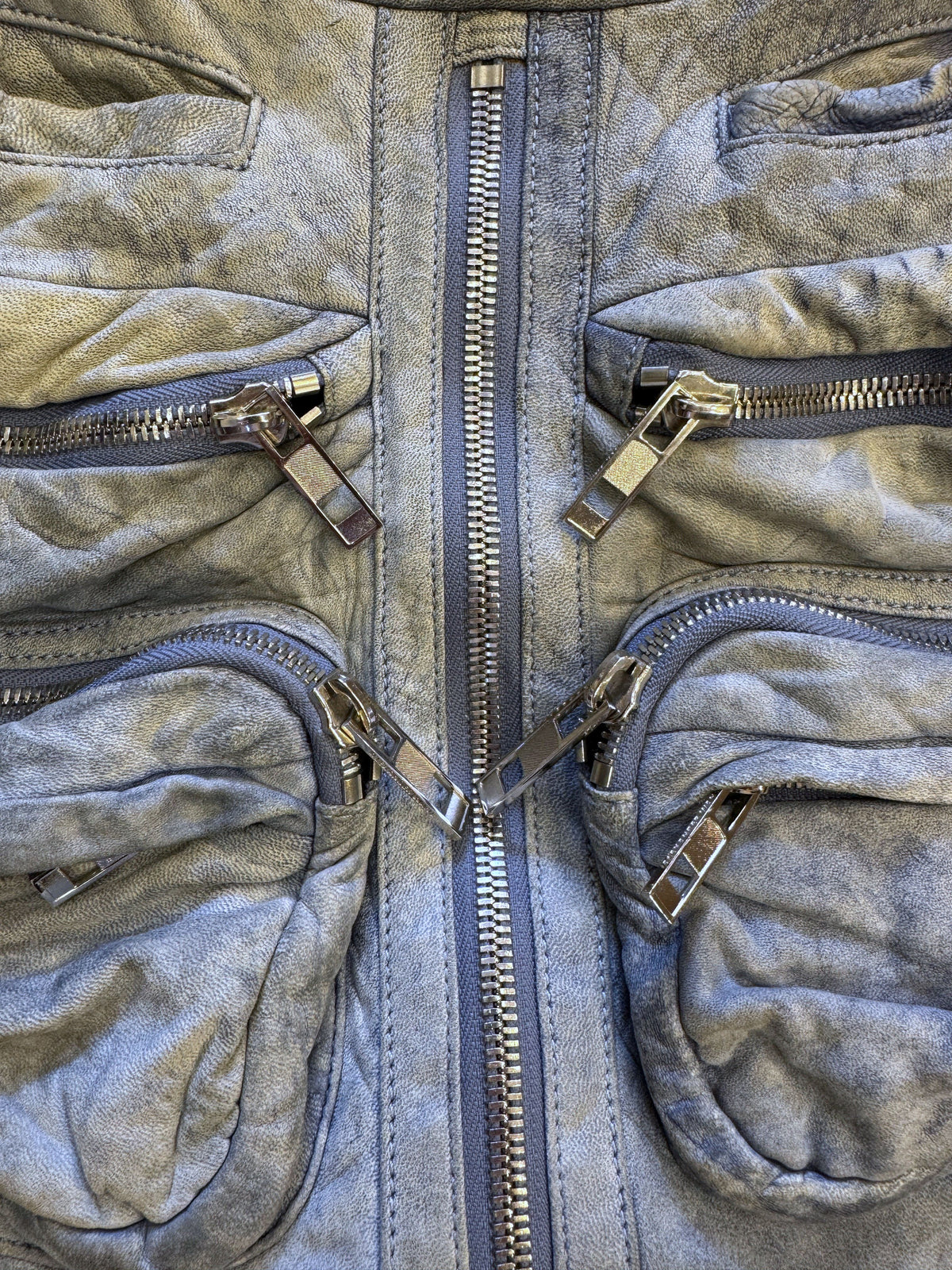 Brandsamsara Alexander Wang blue distressed suede shoulder bag featuring multiple silvertone zip pockets