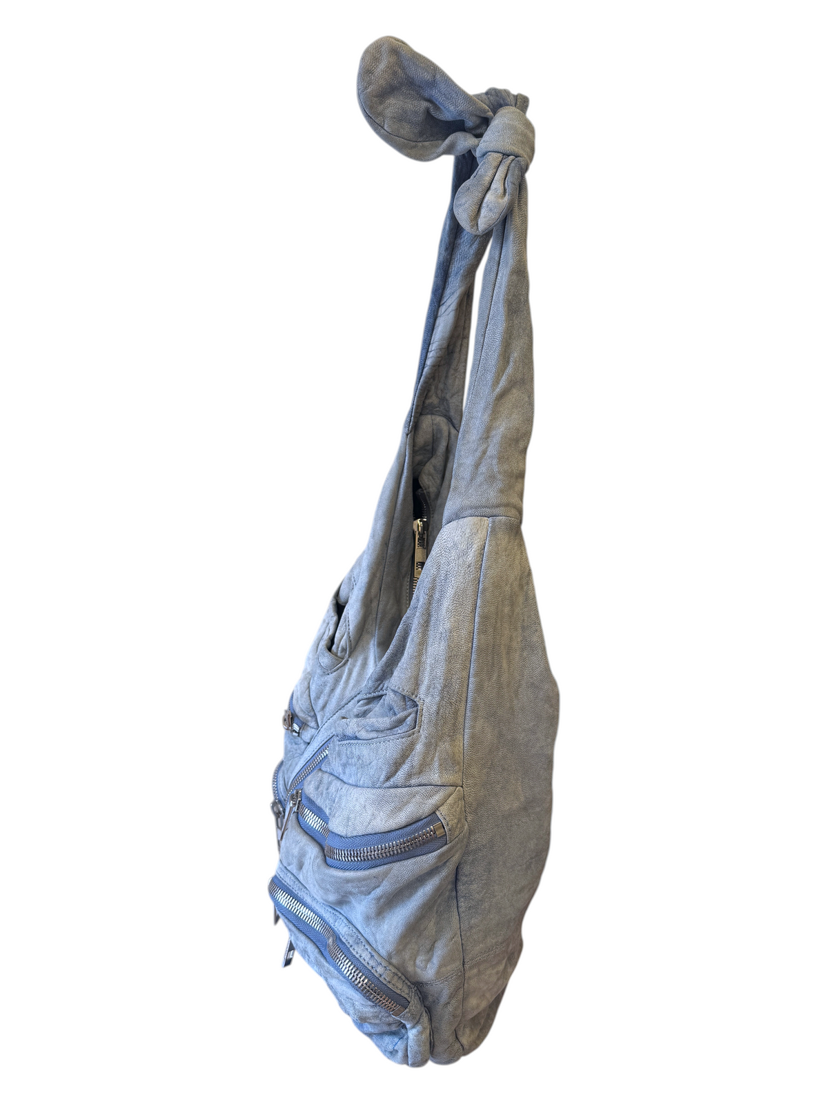 Brandsamsara Alexander Wang blue distressed suede shoulder bag with silvertone zip pockets hanging on a wooden rack