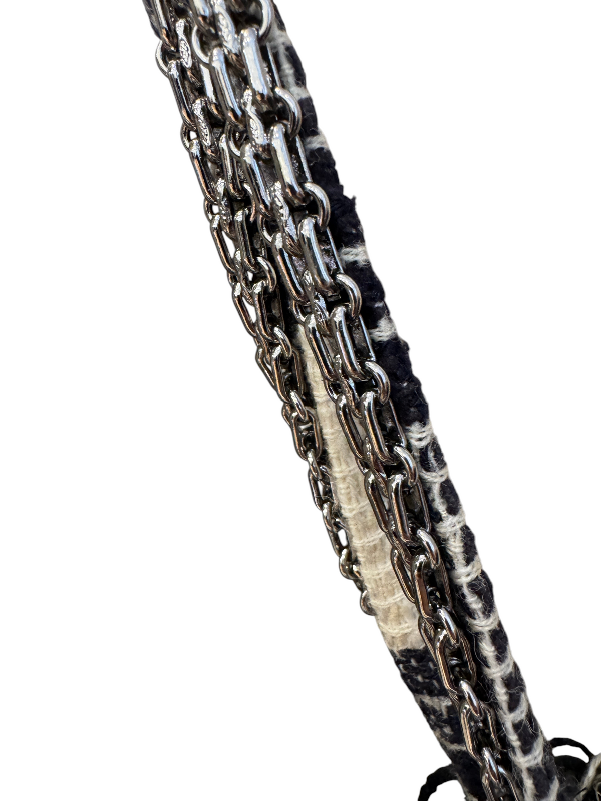 Brandsamsara vintage Chanel shoulder bag featuring a classic silver chain strap interwoven with multicolor tweed.