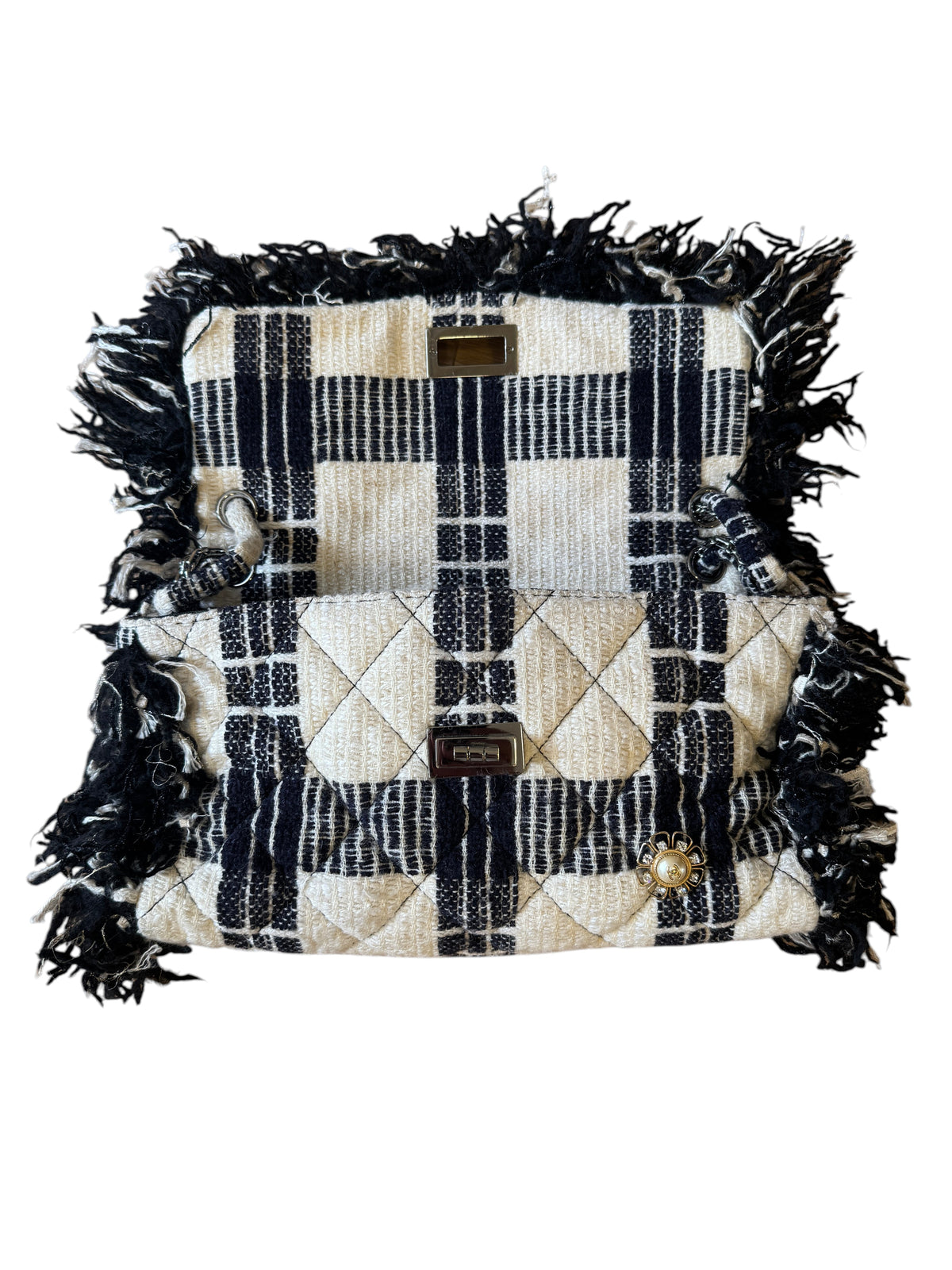 Brandsamsara vintage Chanel flap shoulder bag in black and white plaid tweed with fringe trim and jeweled brooch