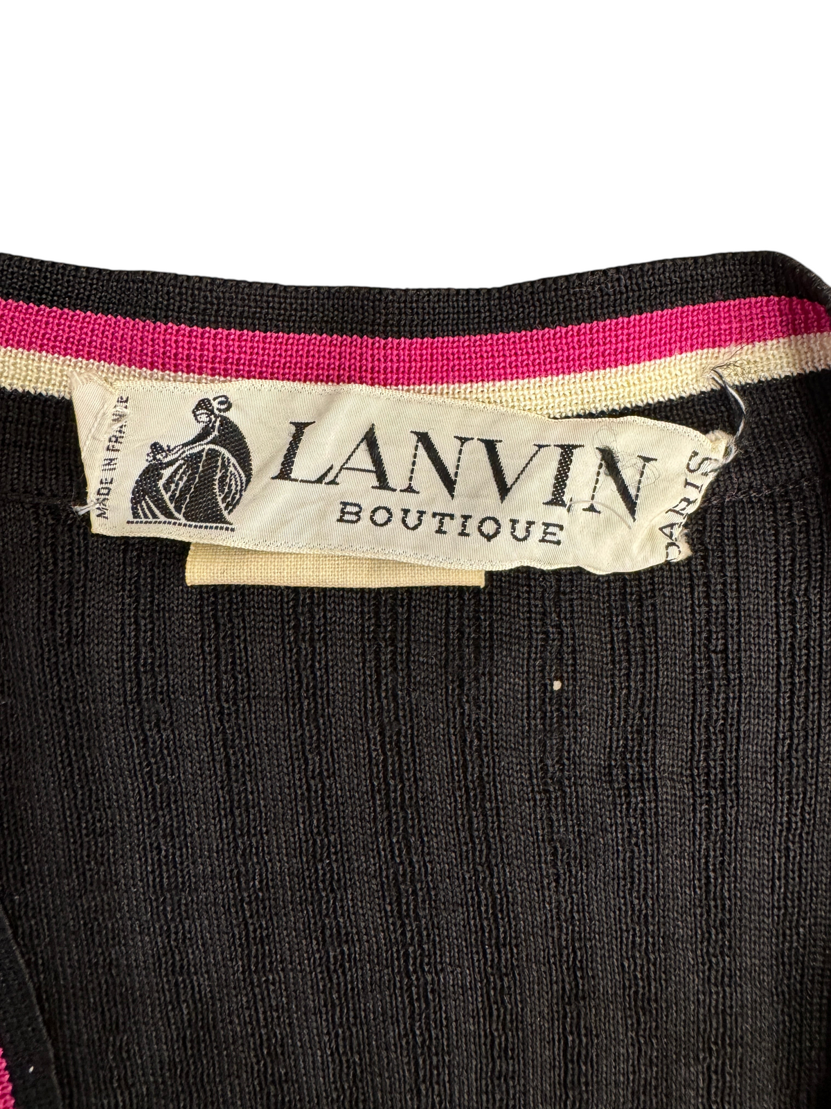 Brandsamsara Lanvin black acetate blend top featuring a white label with pink and cream striped trim