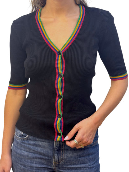 Brandsamsara black ribbed cotton top with rainbow striped v-neck and button-down front, worn by a woman.