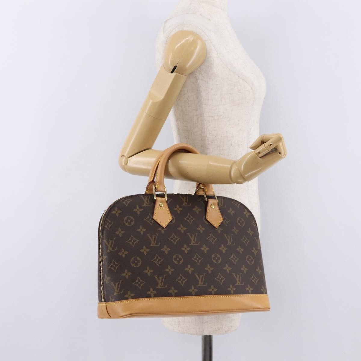 Louis Vuitton Alma Monogram Canvas, Brown, Canvas, Handbag