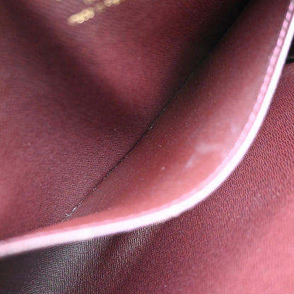 Louis Vuitton Pochette Baikal Clutch Taiga Leather, Burgundy, Leather, Clutch