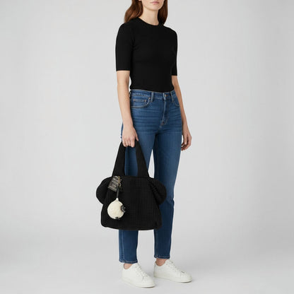 Brandsamsara black knitted shoulder bag with leather details and a sheep charm. Features cotton lining and leather bottom panel.