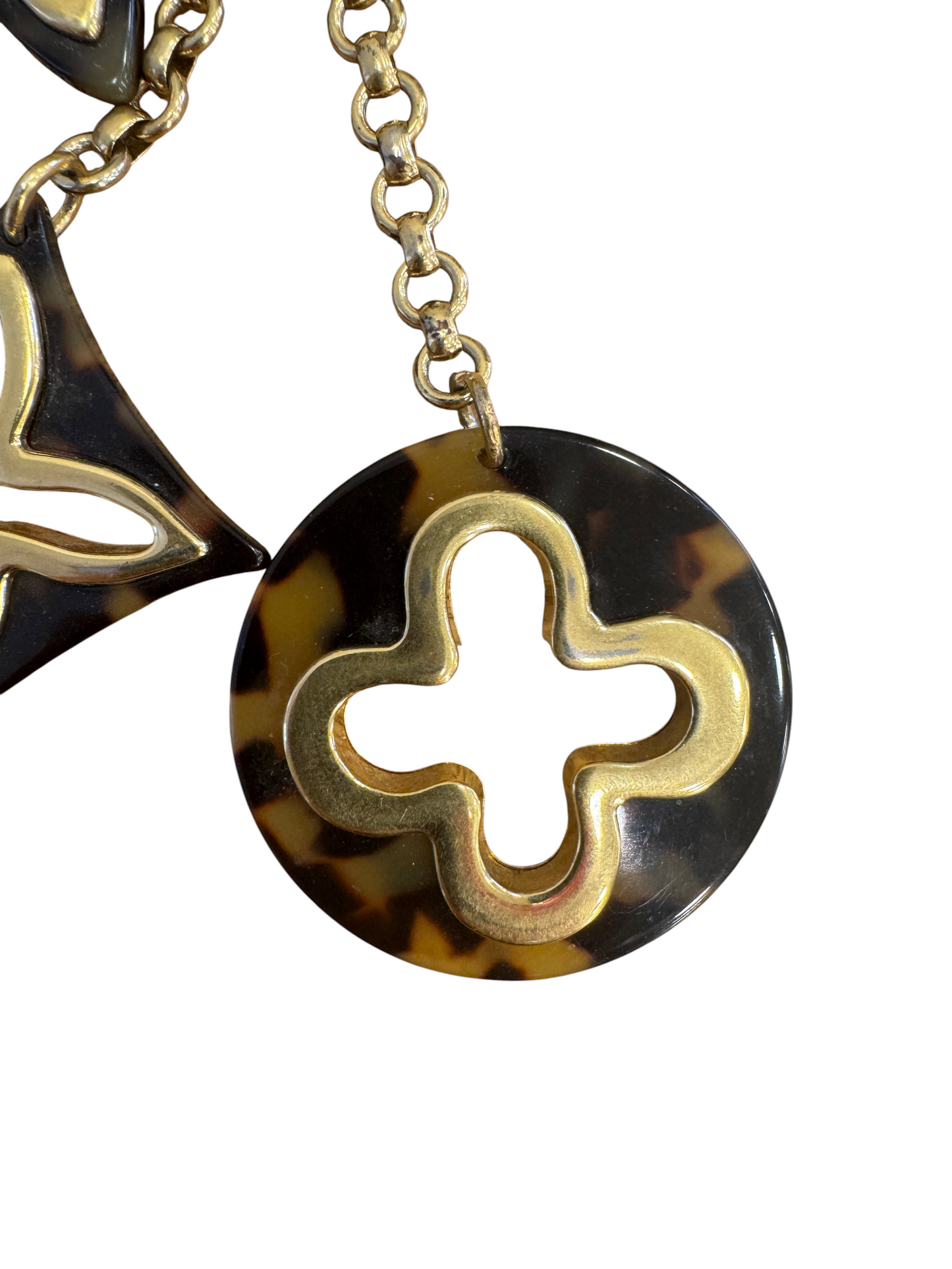 Brandsamsara Louis Vuitton Bijoux Sac Insolence bag charm featuring gold-tone brass and brown tortoise shell resin.