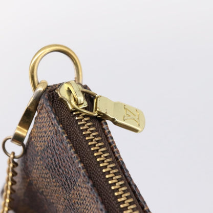 Louis Vuitton Mini pochette accessoires Damier Canvas, Brown, Canvas, Clutch