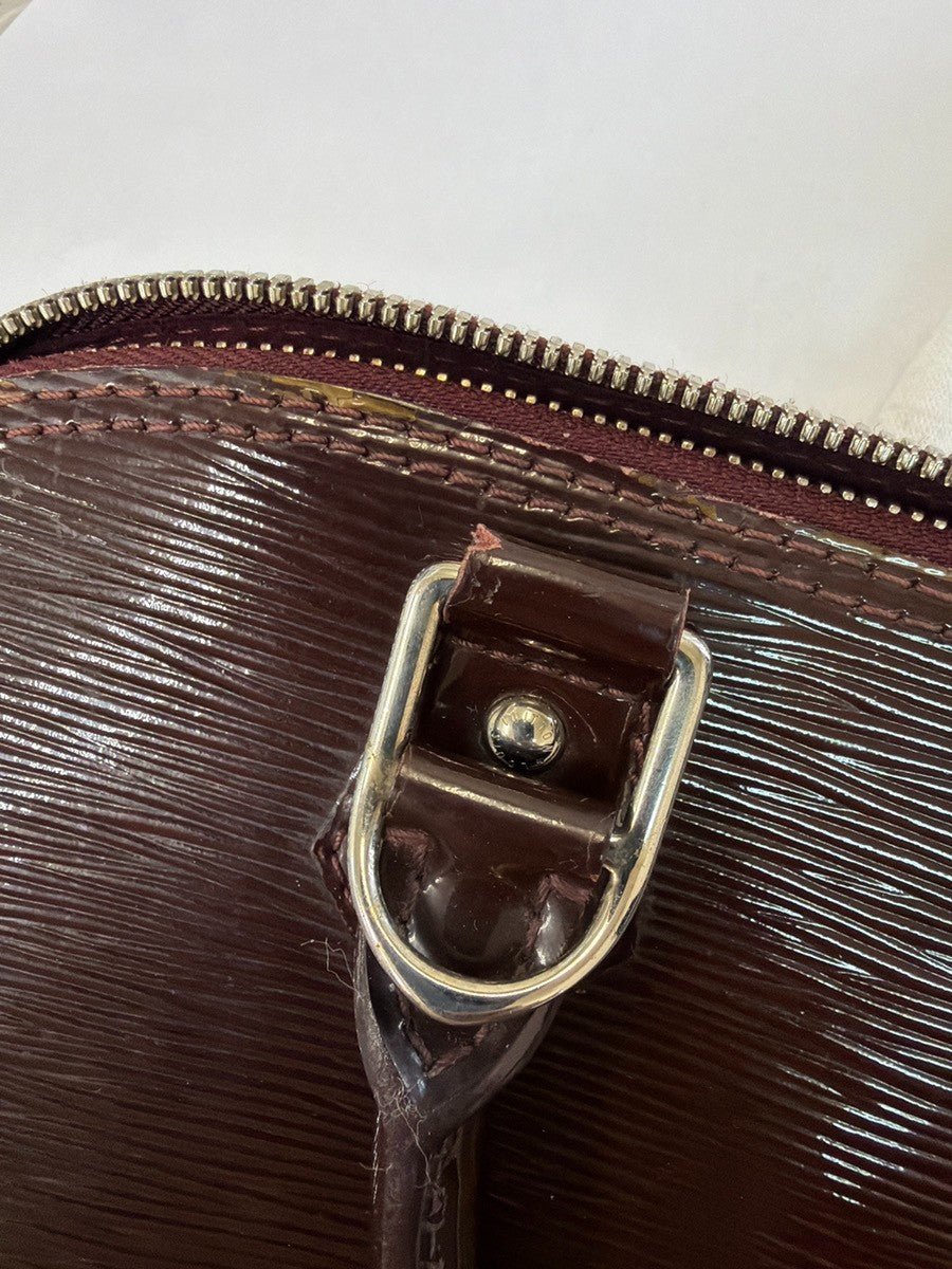Louis Vuitton Alma Handbag - Brandsamsara