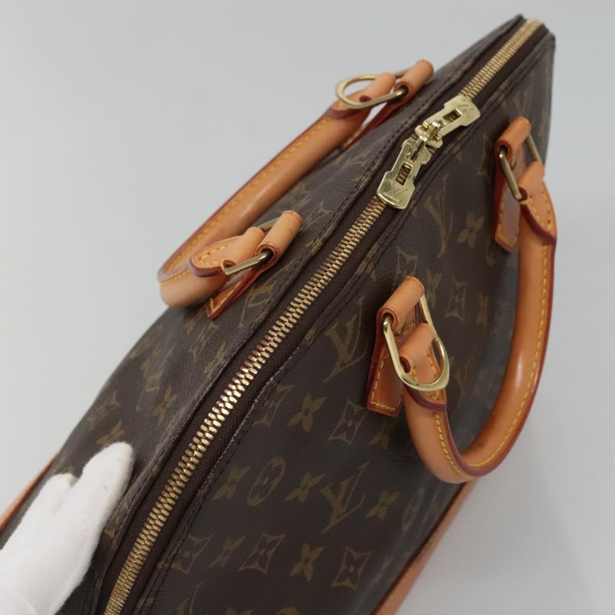 Louis Vuitton Alma Handbag - Brandsamsara