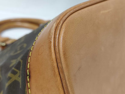 Louis Vuitton Alma Handbag - Brandsamsara