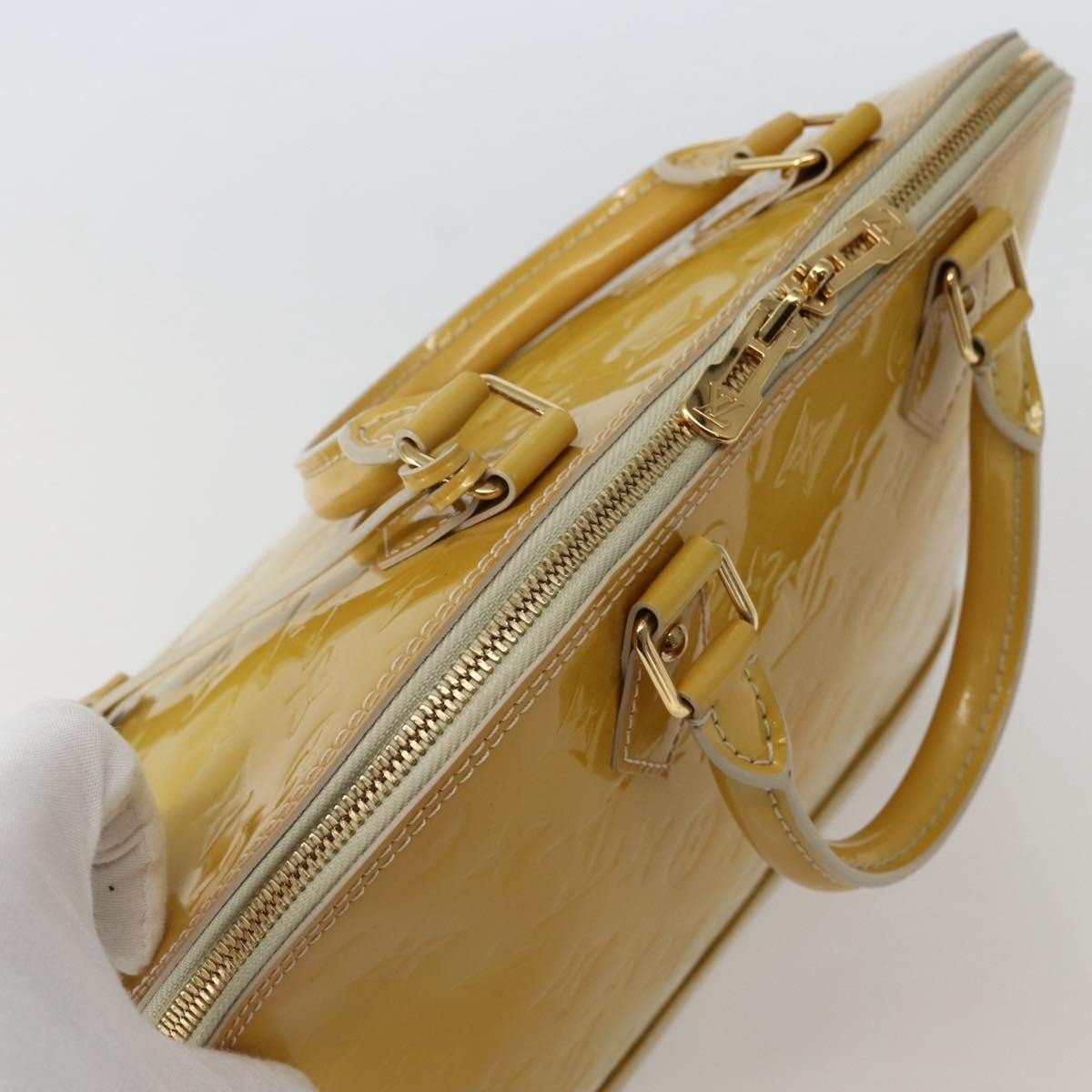 Louis Vuitton Alma Handbag - Brandsamsara