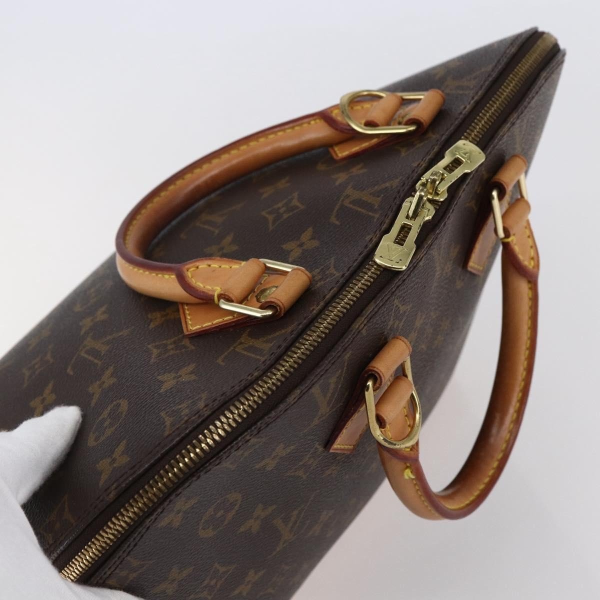 Louis Vuitton Alma Handbag - Brandsamsara