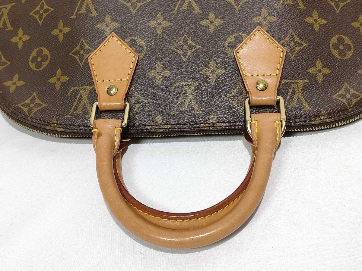 Louis Vuitton Alma Handbag - Brandsamsara