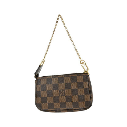 Louis Vuitton Mini pochette accessoires Damier Canvas, Brown, Canvas, Clutch