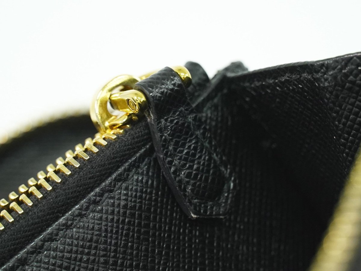 Prada Zip Around Tab Wallet - Brandsamsara