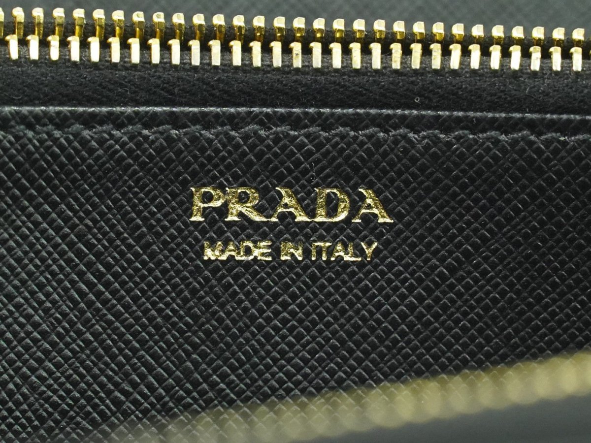 Prada Zip Around Tab Wallet - Brandsamsara