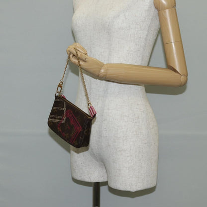 Louis Vuitton Pochette Accessoires Limited Edition Christmas Animation Monogram Canvas, BROWN, CANVAS, Clutche & pouche