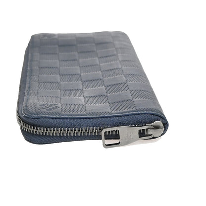 Louis Vuitton Zippy wallet vertical Damier Infini Leather, BLUE, LEATHER, Wallets