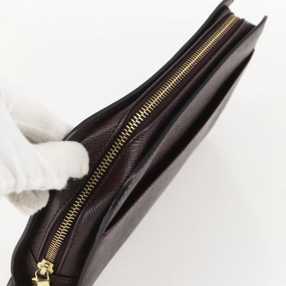 Louis Vuitton Pochette Baikal Clutch Taiga Leather, BROWN, LEATHER, Clutche & pouche
